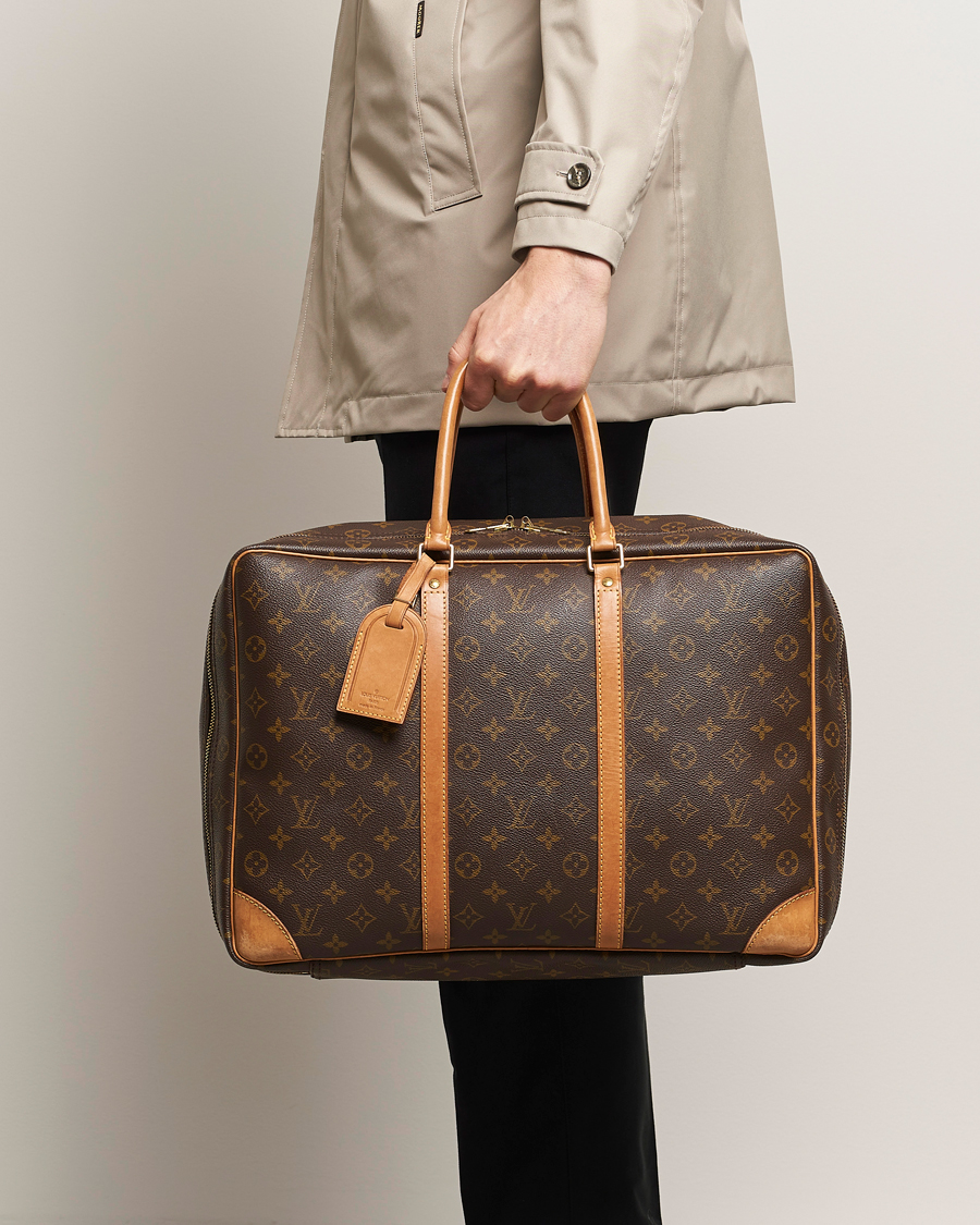Herren | Louis Vuitton Pre-Owned Stratos Cloth bag Monogram | Louis Vuitton Pre-Owned | Stratos Cloth bag Monogram